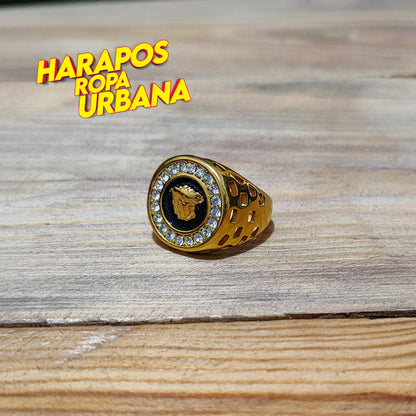 Anillo de acero versace dorado circulo con diamantes