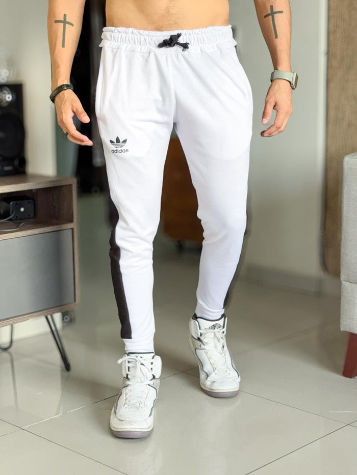 Buso adidas blanco con franja lateral negra