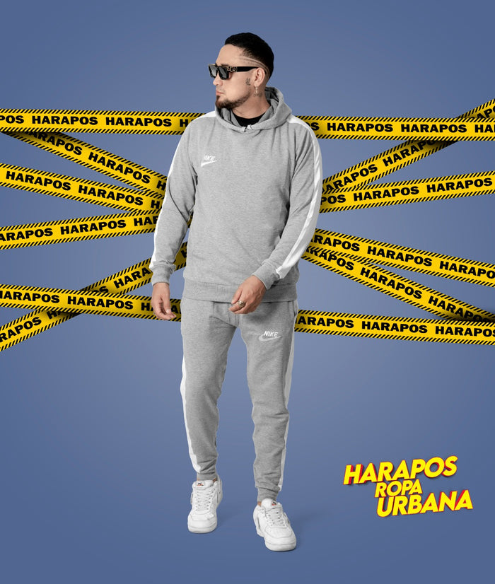 Deportivo nike plomo con franja blanca
