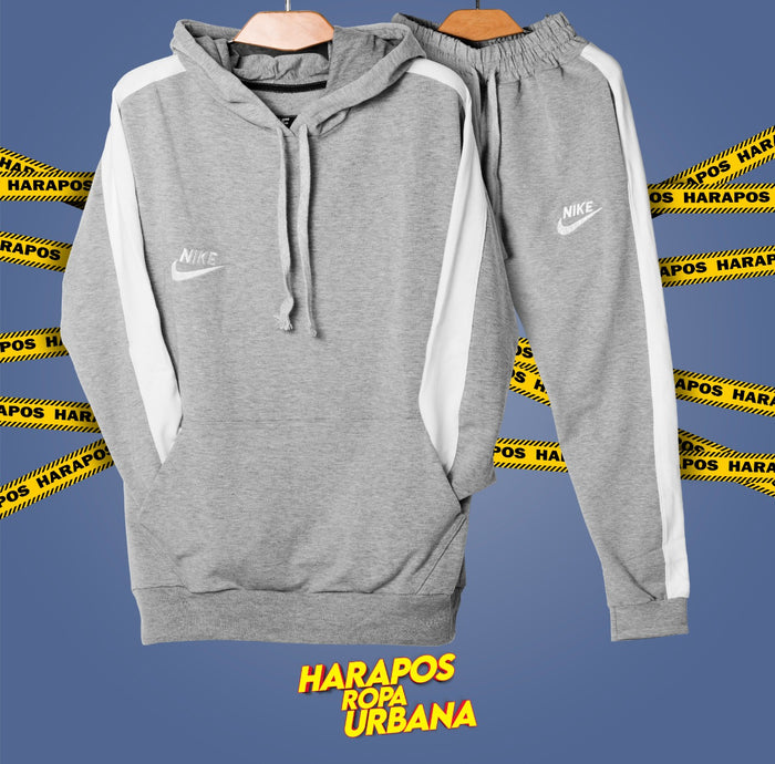 Deportivo nike plomo con franja blanca