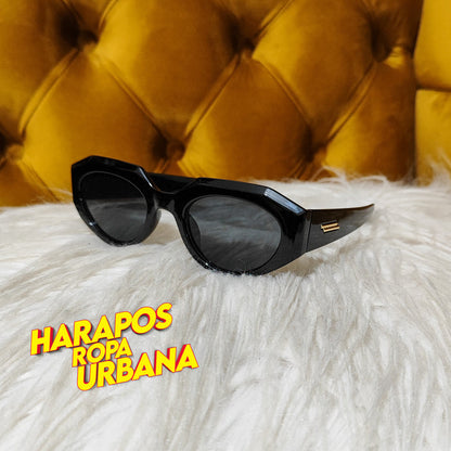Gafas negra con lineas doradas