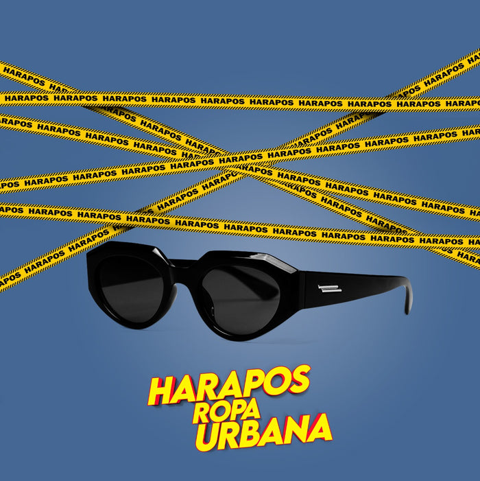Gafas negra con lineas doradas