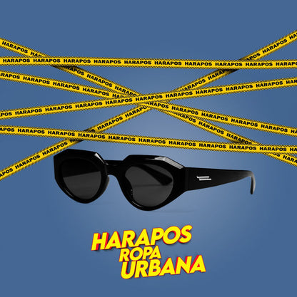 Gafas negra con lineas doradas