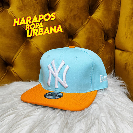 Gorra new york NY plana celeste base naranja gamuzada
