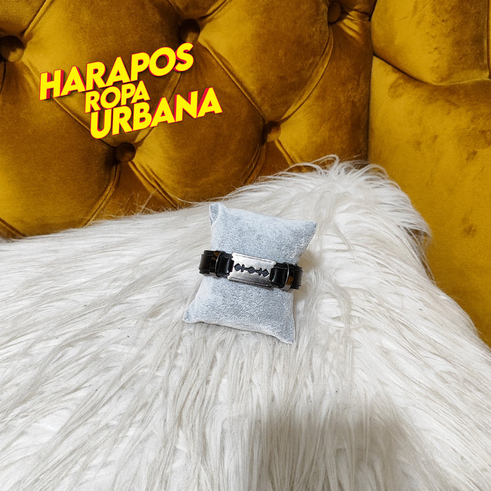 Manilla negra de cuero con diseño de gillette
