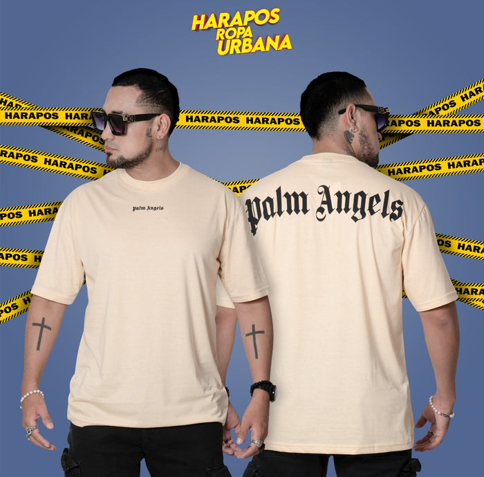 Polera ovsersize palm angels crema letras negras